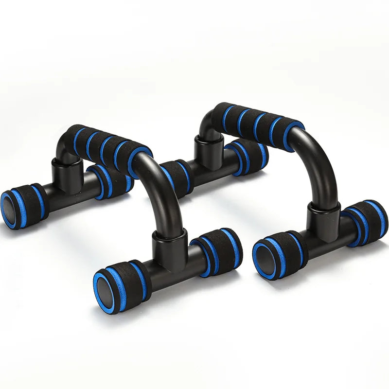 Par de push up stands para exercício, com pega de esponja e design ergonómico, ideal para treinos de fitness.