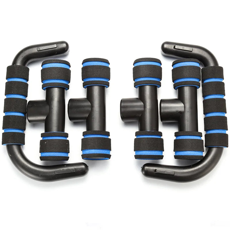 Par de push up stands para exercício, com pega de esponja e design ergonómico, ideal para treinos de fitness.