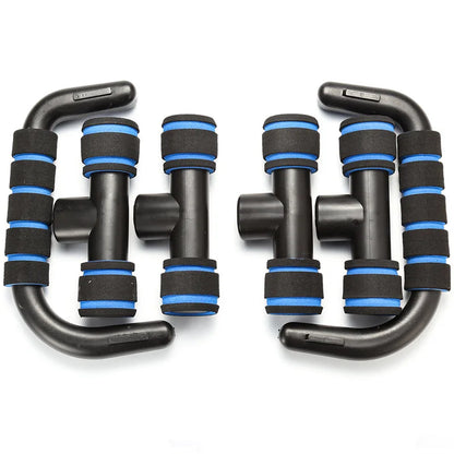 Par de push up stands para exercício, com pega de esponja e design ergonómico, ideal para treinos de fitness.