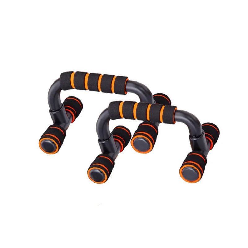 Par de push up stands para exercício, com pega de esponja e design ergonómico, ideal para treinos de fitness.